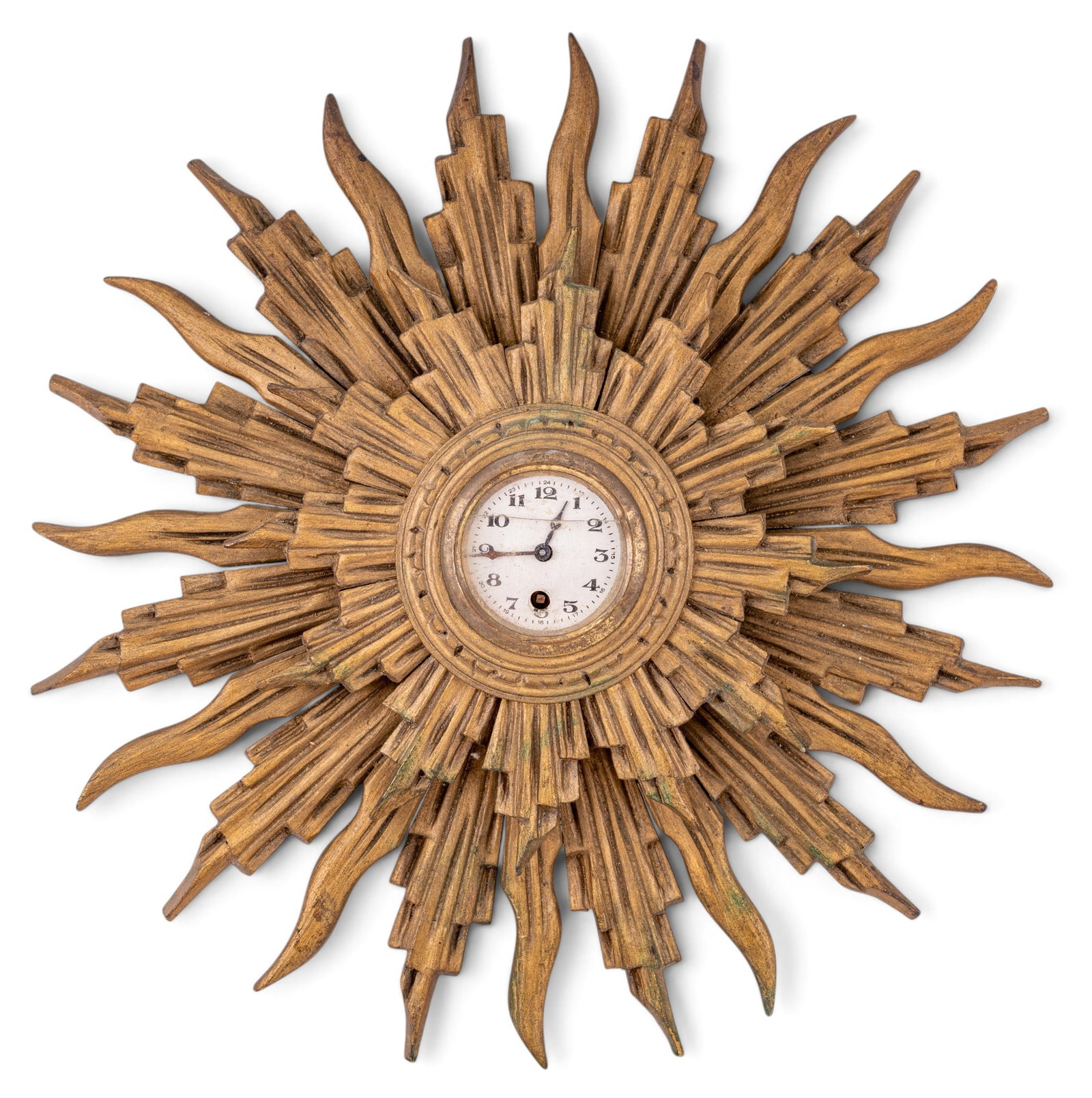 Antique French Giltwood Art Deco Sunburst Clock: Early 20th-century French giltwood starburst wall clock. Features prominent, multi-tiered fluted "soleil" frame. This antique piece highlights the transition between late 19-century French traditional