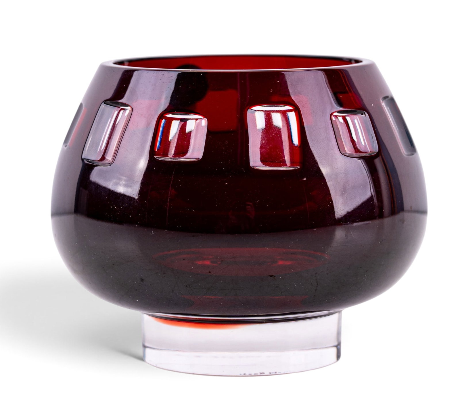 Nick Munro for Tyrone Crystal Votive Holder: A ruby cut to clear crystal votive holder in the Nick Munro collection for Tyrone Crystal, measures approx. 4" diam x 3.25" H.