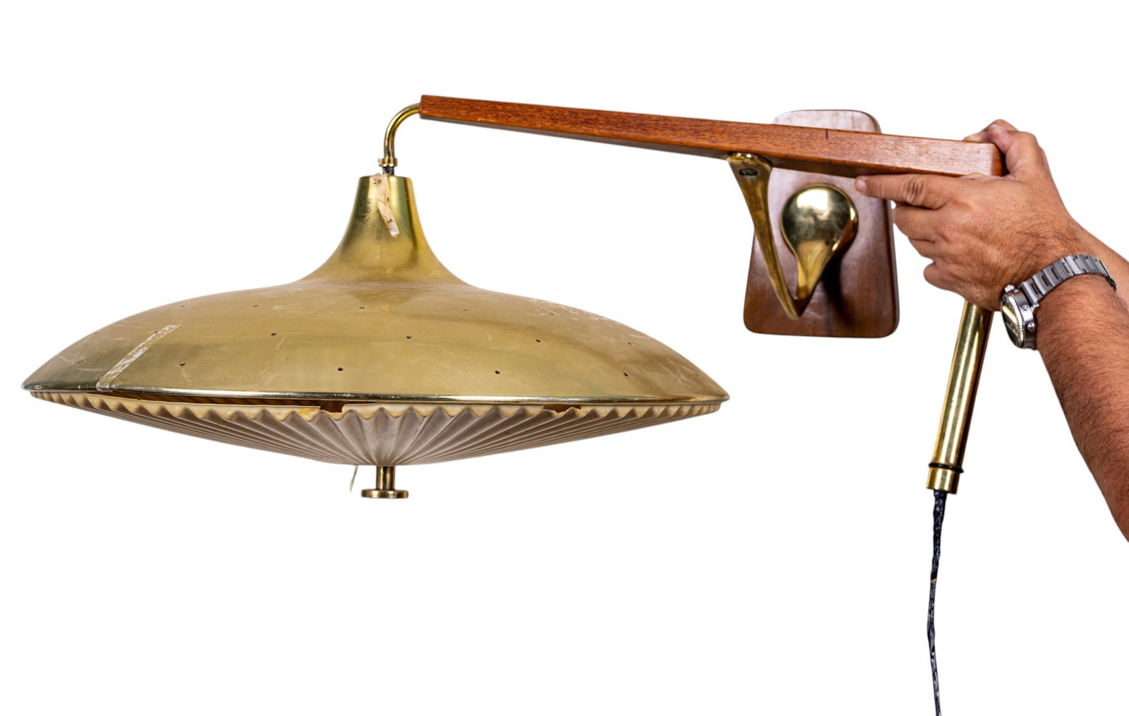 MCM Brass and Teak Wood Light Fixture: A vintage mid century modern brass and teak wood hanging light fixture featuring a brass 'flying saucer' triple socket light attached to a brass and teak arm and mounted to a teak base. Will require