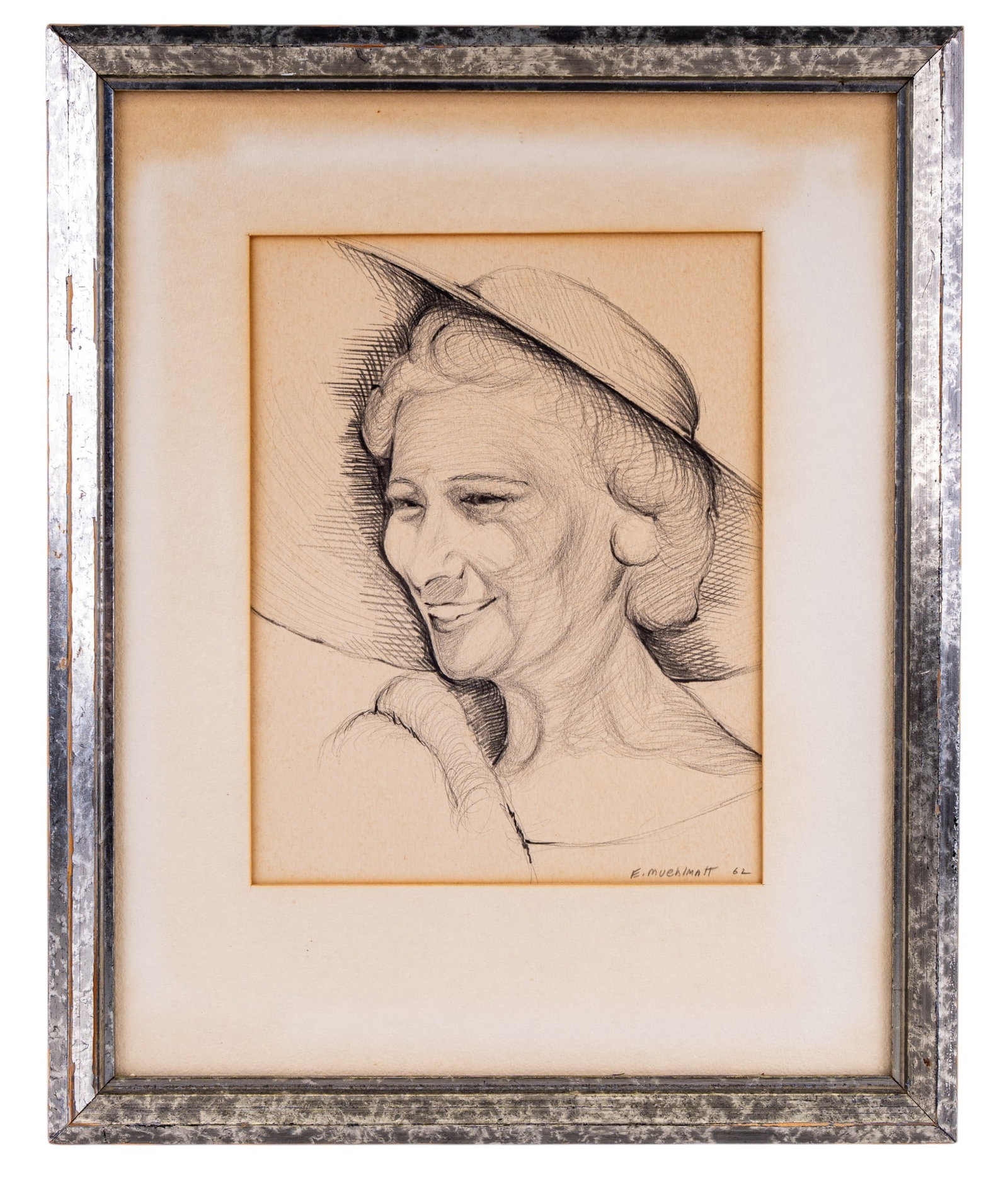 1962 Ernest F. Muehlmatt (Am 1927-2016) Portrait: A framed sketch / drawing depicting the portrait of an older woman in a hat, smiling, signed in the lower right corner by Ernest F.. Muehlmatt (American 1927-2016), dated 1962. This was made in the