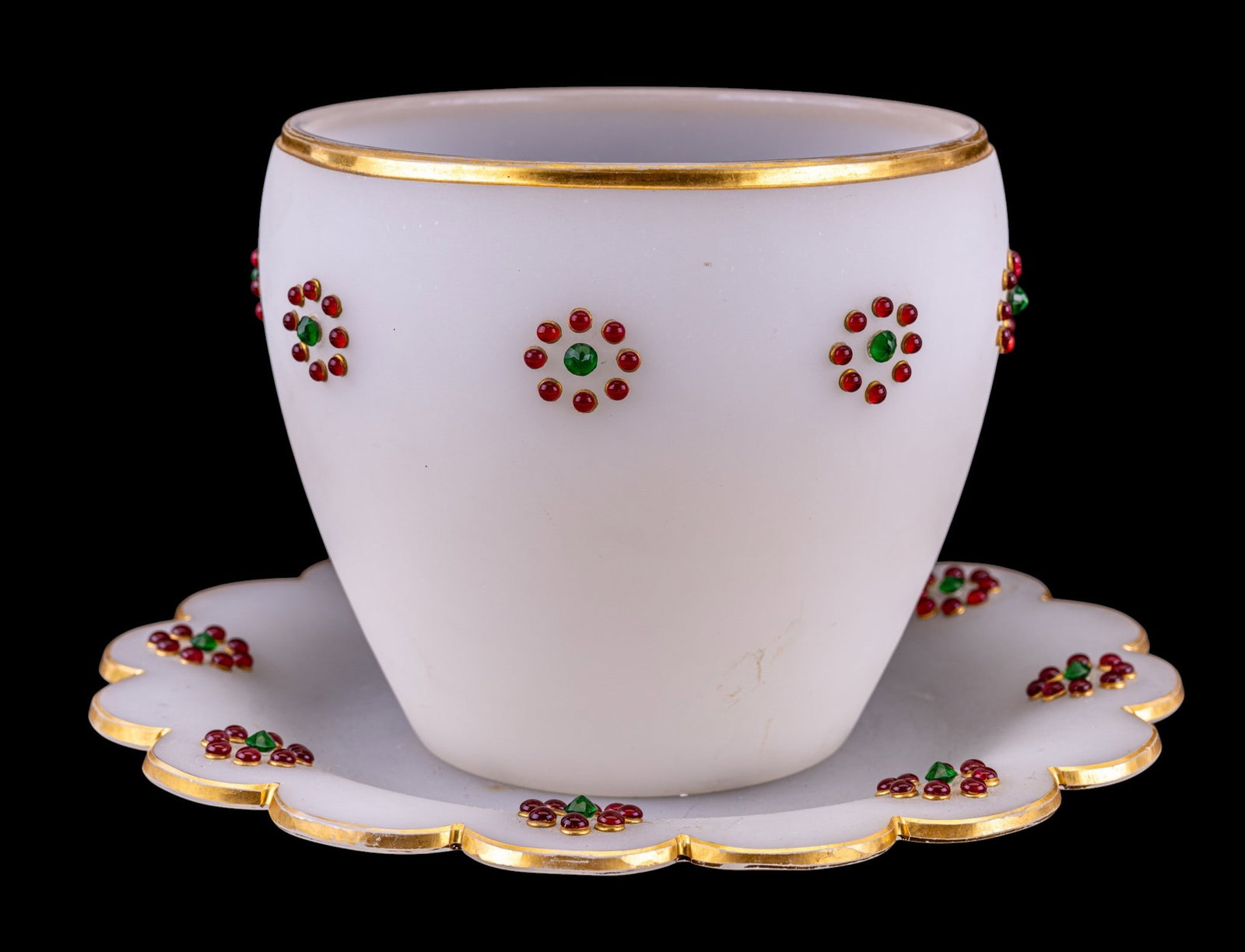 Jeweled White Opaline Glass Punch Bowl & Platter: Matching punch bowl and platter set in white opaline, also known as milky white, glass. Detailed with gilt rims and floral jeweled decorations. Each flower cluster composed of vibrant green cabochon j