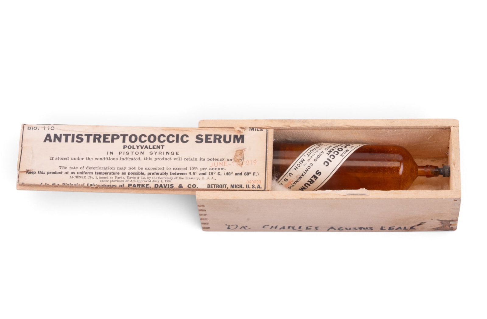 Antique Antistreptococcic Bottle and Box: An antique Antistreptococcic serum piston syringe, note the bottom is broken and repaired with a cork, includes box with manufacture date stamp of June 11, 1919.