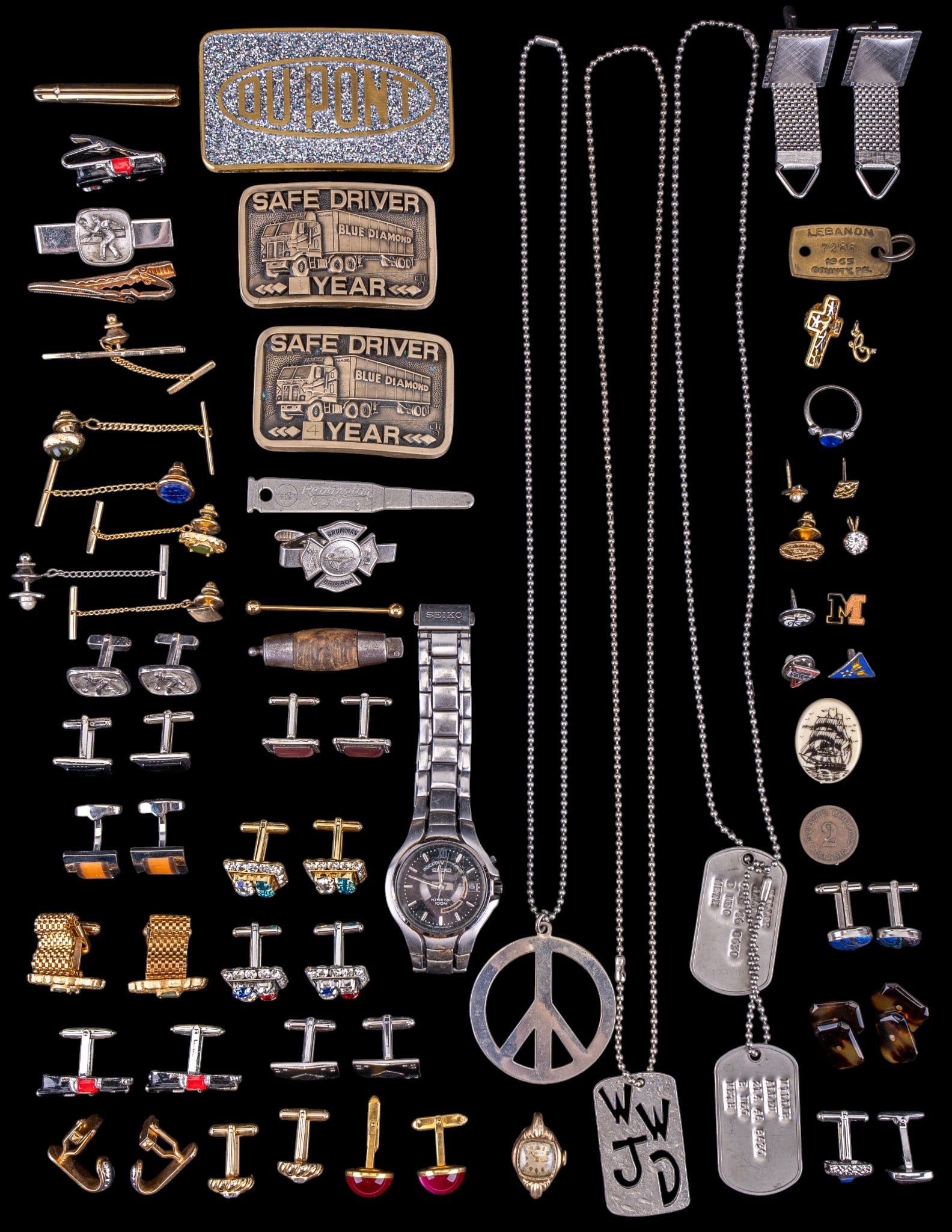 Seiko, Bulova, Cufflinks, and More: A collection of vintage men's accessories including a Seiko wrist watch #2N1098, a Bulova A9 17 jewel ladies wrist watch movement #596418, an assortment of cufflinks, tie bars, and lapel pins by