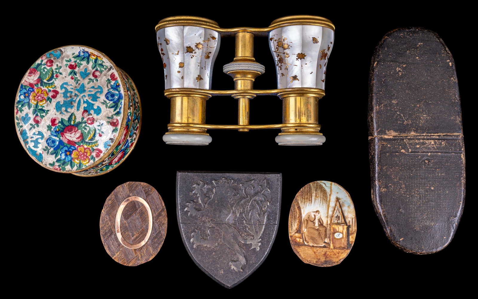 Lemaire Lumelle Duchesse Opera Glass and More: A pair of antique Lemaire Lumelle Duchesse monogrammed opera glass featuring mother of pearl and floral bronze inlay, an antique leather eyeglass case, bronze shield badge featuring a crowned rampant 
