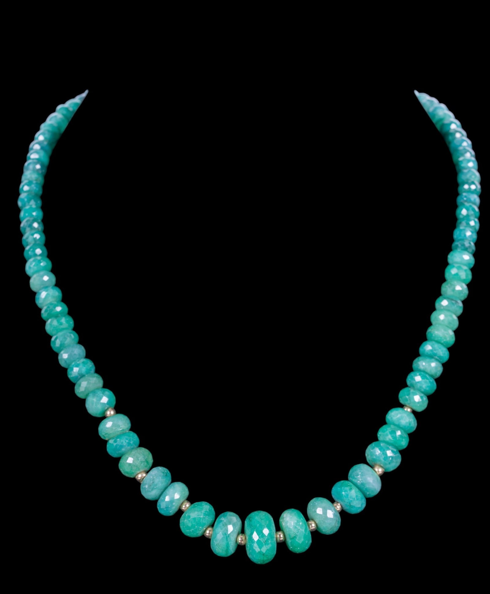 Faceted Emerald Bead Necklace w/ 14K Gold Clasp: Necklace comprising graduated faceted emerald rondelle beads, accented with yellow gold spacer beads and completed with a 14K yellow gold clasp. Measures approx. 8.5" Drop length.