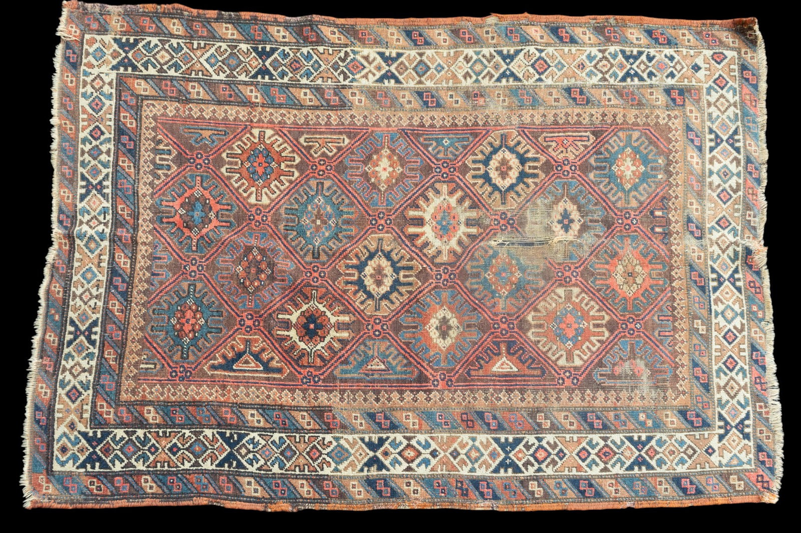 Antique Persian Rug: Muted tones, geometric motifs. 3'6" x 4'8"