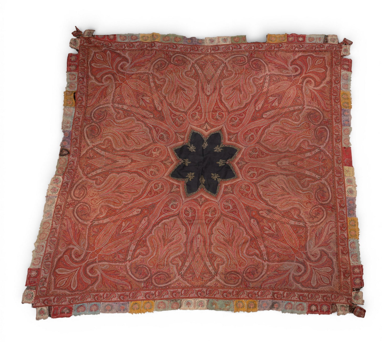 Antique Hand Made Paisley Shawl: Antique hand sewn paisley shawl, note some edge loss due to age and use, measures approx. 70" W x 70" L.
