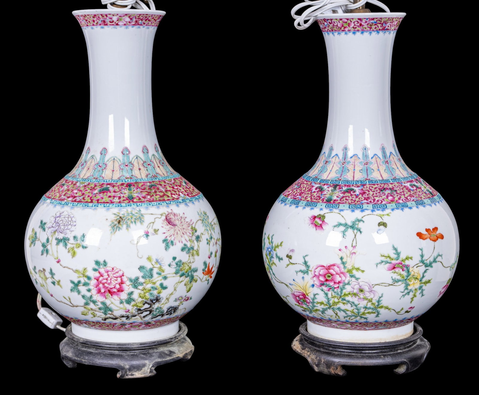 Pair, 19th C Chinese Famille Rose Vase Lamps: Pair of 19th century Chinese famille rose porcelain bottle-form vases, each having a globular body rising to a tall flaring neck. Decorated in polychrome enamels with flowering branches and blossoms b