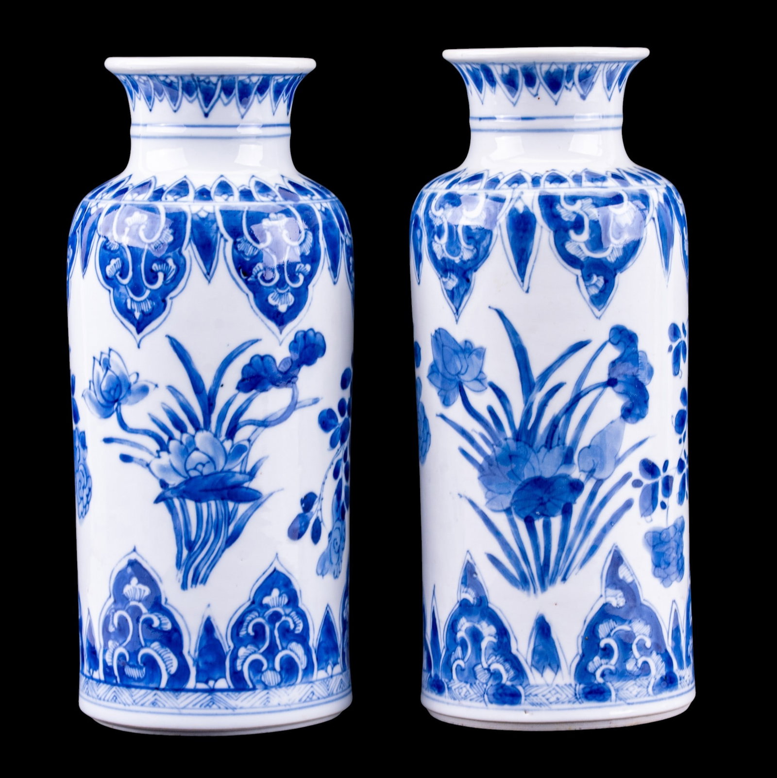 Chinese Blue & White Porcelain Sleeve Vases (2): A pair of Chinese blue and white floral decorated porcelain sleeve vases, all measure approx. 8" H. From the Estate of Carol and George Thomassy, Hanover, PA.