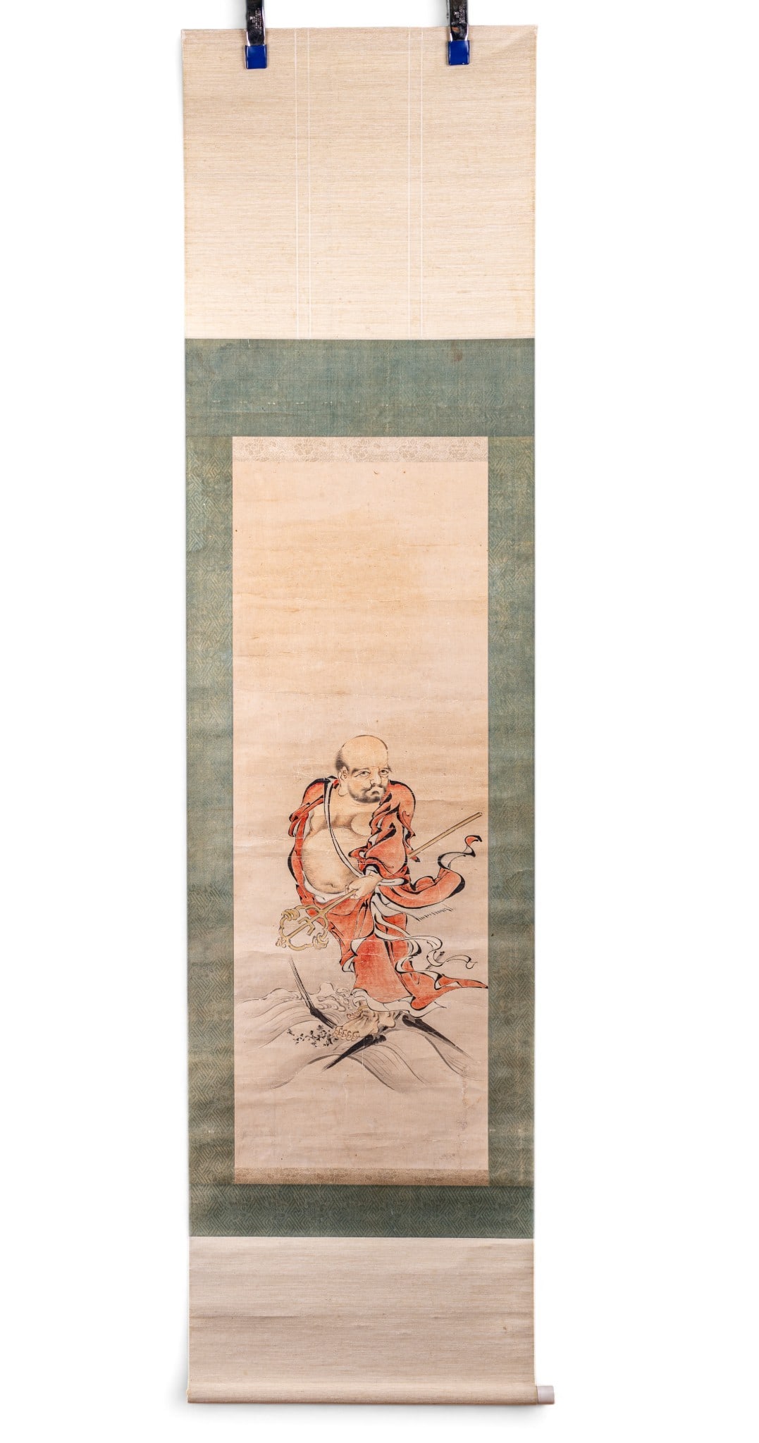 Japanese Watercolor Hanging Scroll: Japanese hanging scroll featuring a Japanese Buddhist or legendary figure, possibly a stylized depiction of Bodhidharma (Daruma) or another wandering holy man. A thin wooden semicircular stave