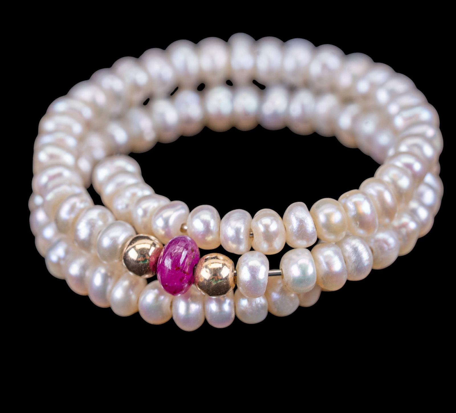 Pearl and 14K Stretchy Ring: Pearl and 14K bead ring with small ruby accent.