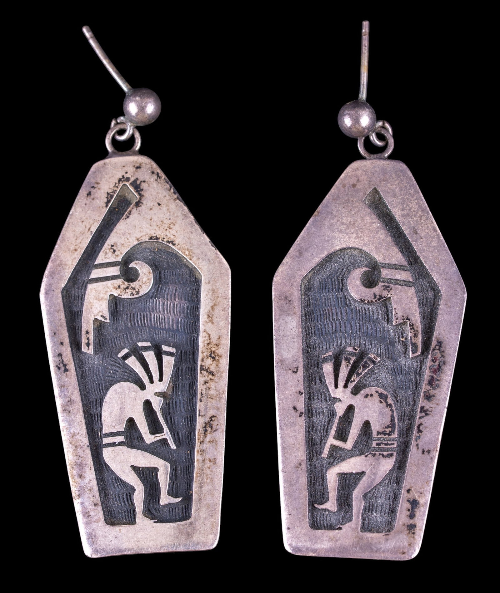 Patrick Tewawina Sterling Kokopelli Earrings: A pair of sterling Kokopelli stud dangle earrings by artisan Patrick Tewawina, weighs approx. 15.4g.