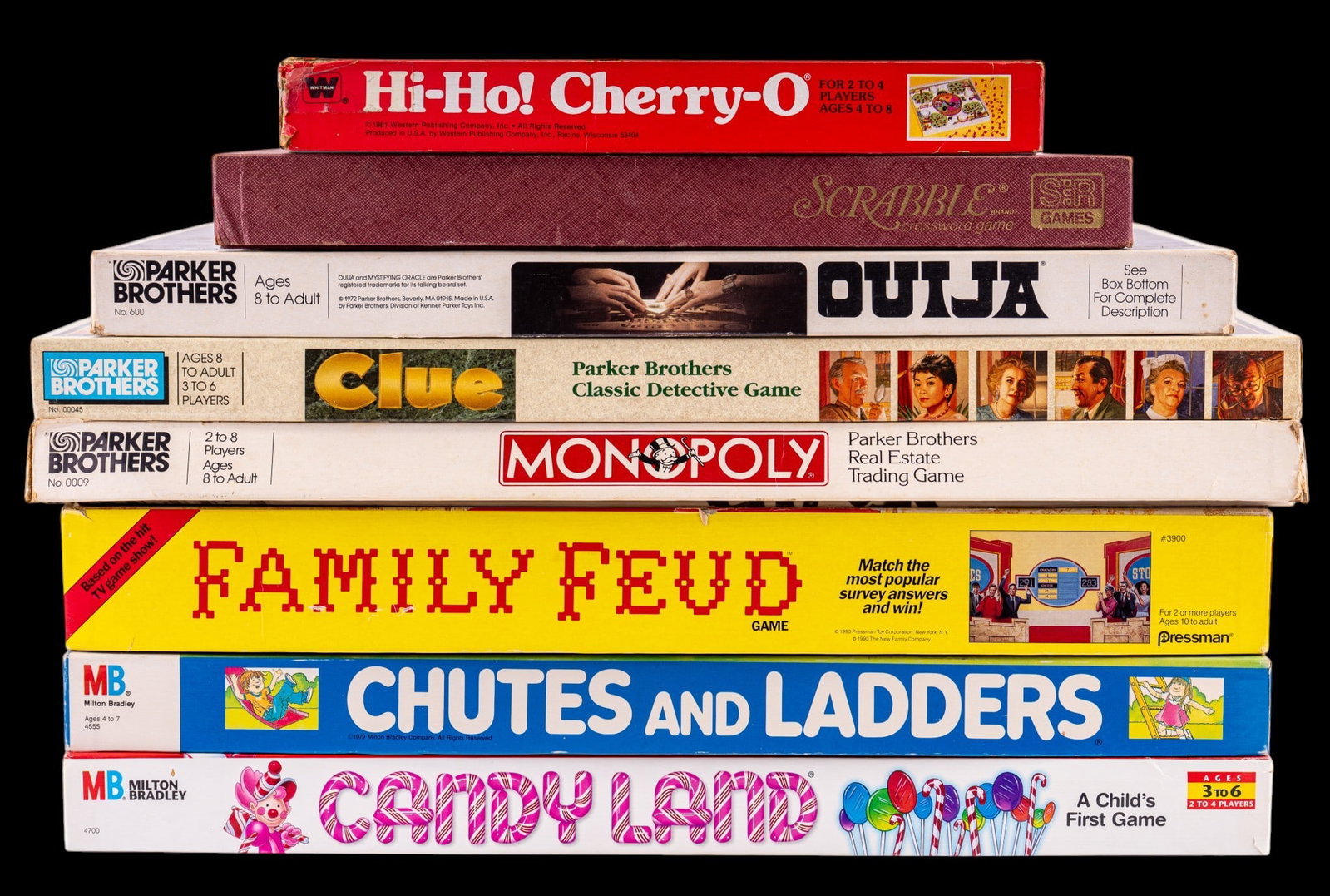 8 Vintage Board Games: 8 vintage board games: Ouija Mystifying Oracle, Clue, Monopoly, Candy Land, Chutes and Ladders, Family Feud, Scrabble (Selchow & Righter), and Hi-Ho! Cherry-O. Features popular titles from Parker Brot