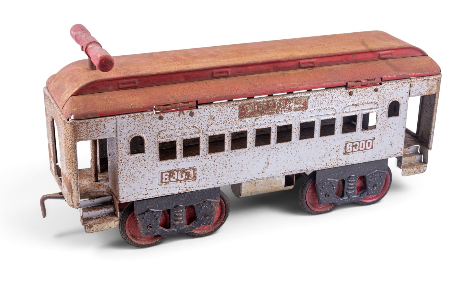 Buddy L 6800 Pressed Steel Trolley Ride-On Toy: Buddy L pressed steel ride-on trolley car with number 6800. Features beige and red paint, open windows, red wheels, and raised handlebar at front. Visible surface rust and paint wear consistent with