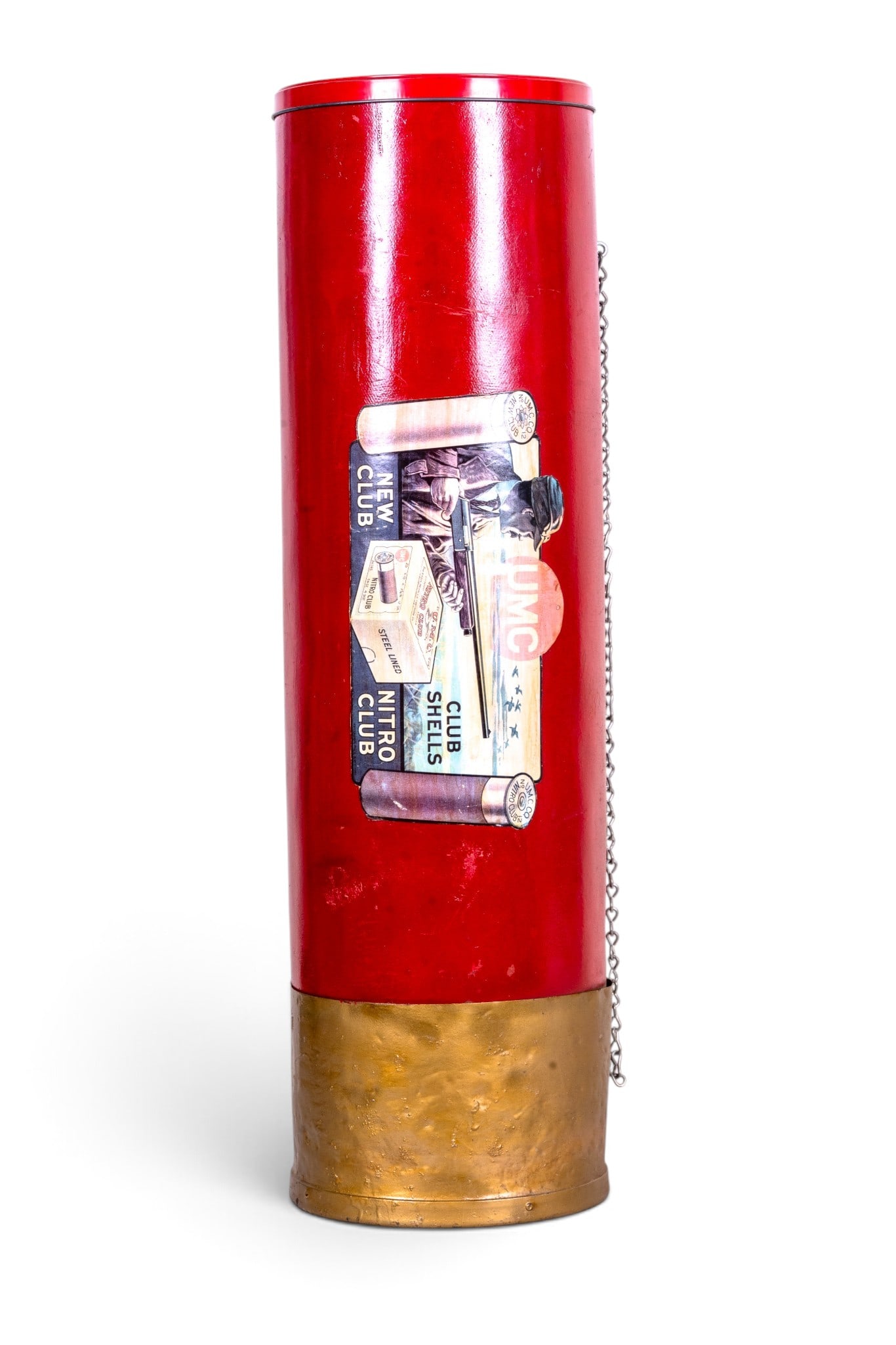 UMC Nitro Club Shotgun Shell Advertising: Shotgun shell display with metal primer end. Fiberglass tube, UMC Nitro Club decal/graphics adhered to the tube. Has a tin cap on the other end. Measures approx. 34.5" L, 10" diameter.