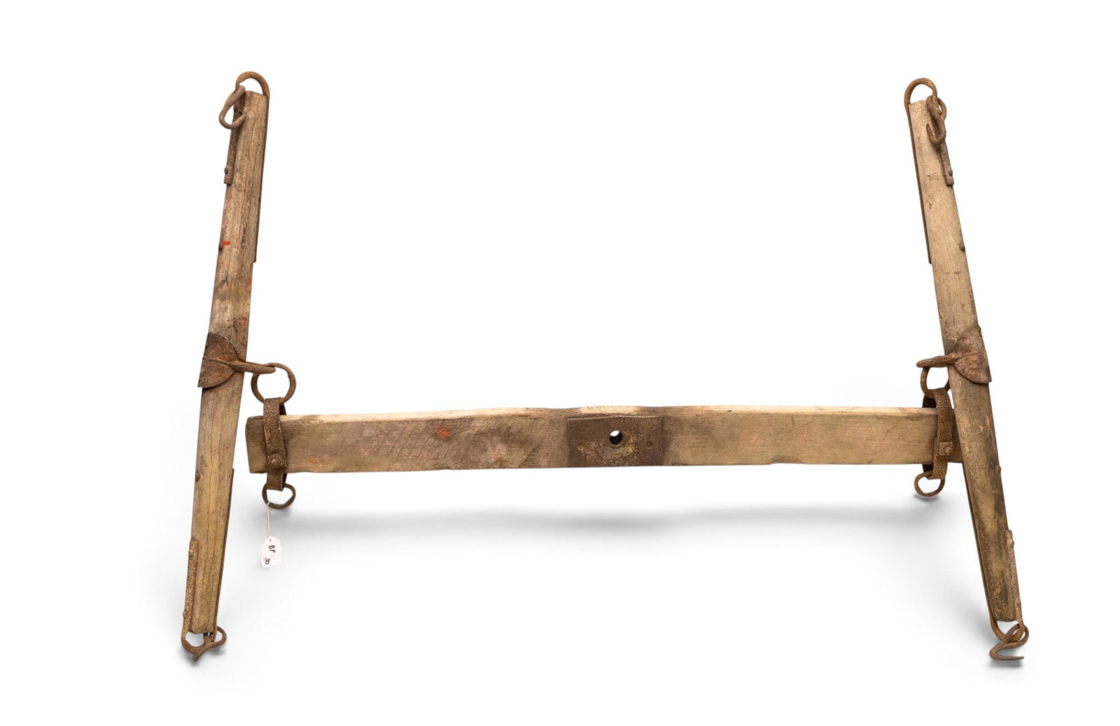 Vintage Wooden Yoke with Iron Hardware: Vintage wooden yoke, constructed from solid wood with attached iron hooks and brackets. It includes a central mounting plate and metal straps at each end. Designed for animal harnessing, it shows