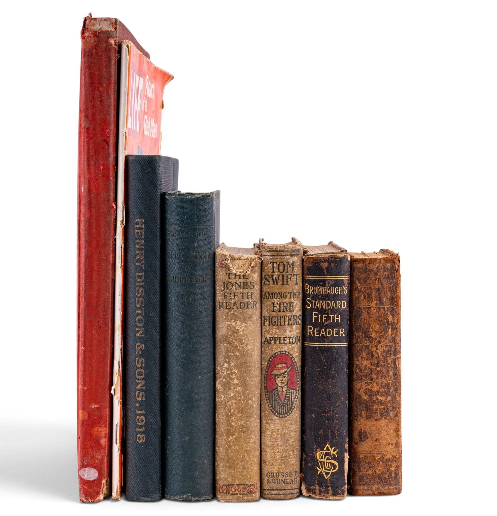 Vintage Books Including One in German: Vintage books featuring a 1918 Henry Disston & Sons catalog, Brumbaugh's Standard Fifth Reader, Jones Fifth Reader, Rand McNally State and County Survey Atlas, Tom Swift Among the Fire Fighters, a 196