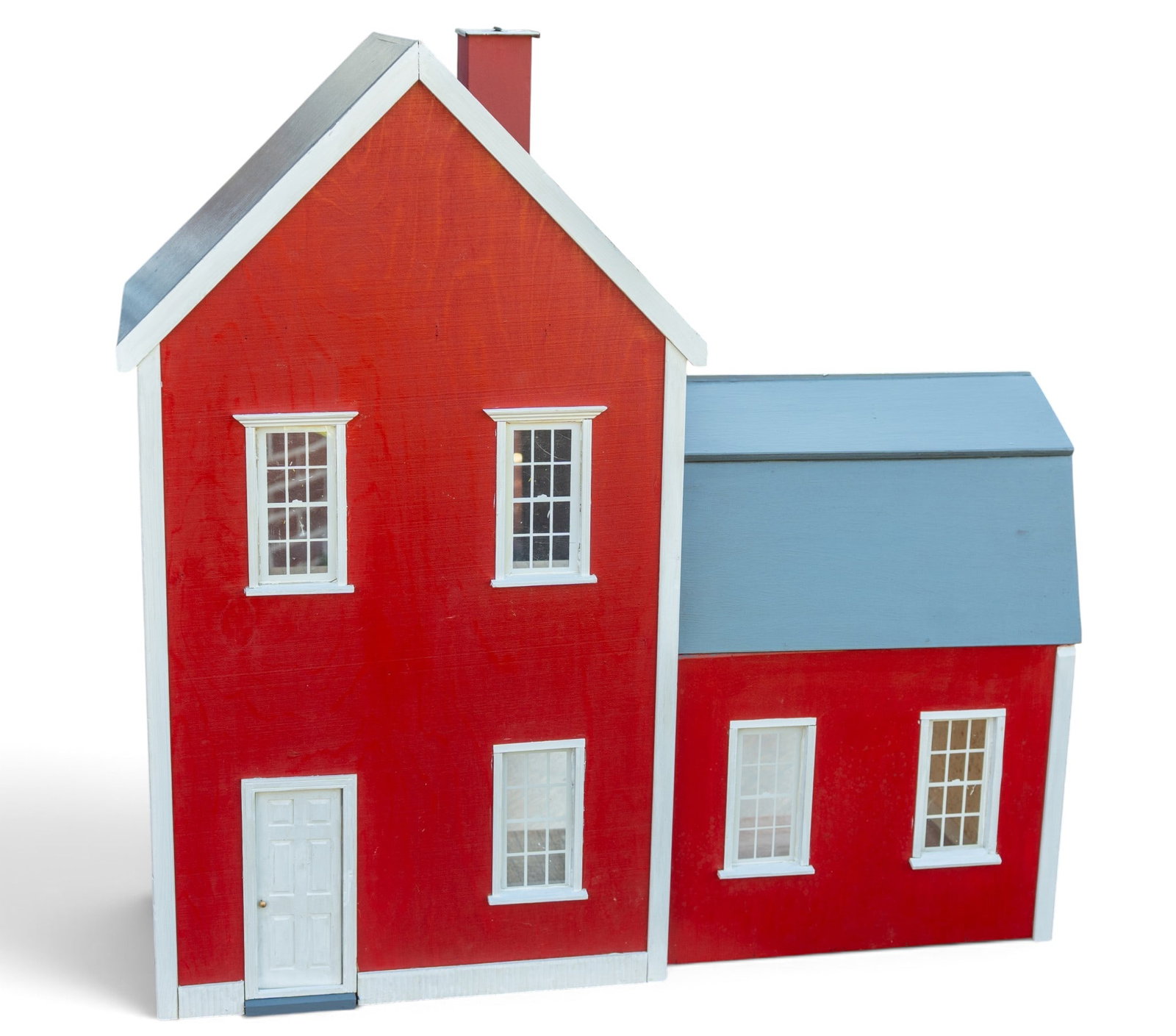 Vintage Hand Made Dollhouse: A vintage hand made wooden dollhouse featuring a red exterior, papered walls, grey painted roof, and white trim, measures approx. 29.5" W x 13" D x 29.5" W.