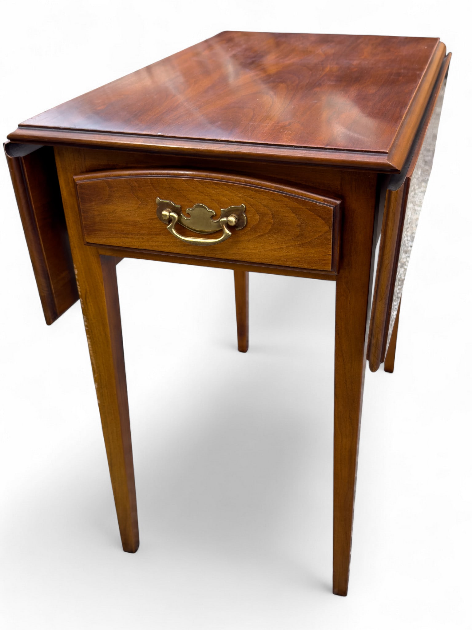 Statton Cherry Pembroke Table: Statton Furniture Co. cherry pembroke drop leaf end table with brass hardware measuring approx. 23" H x 15" W x 24" D. (15" when open). Good condition per photos.