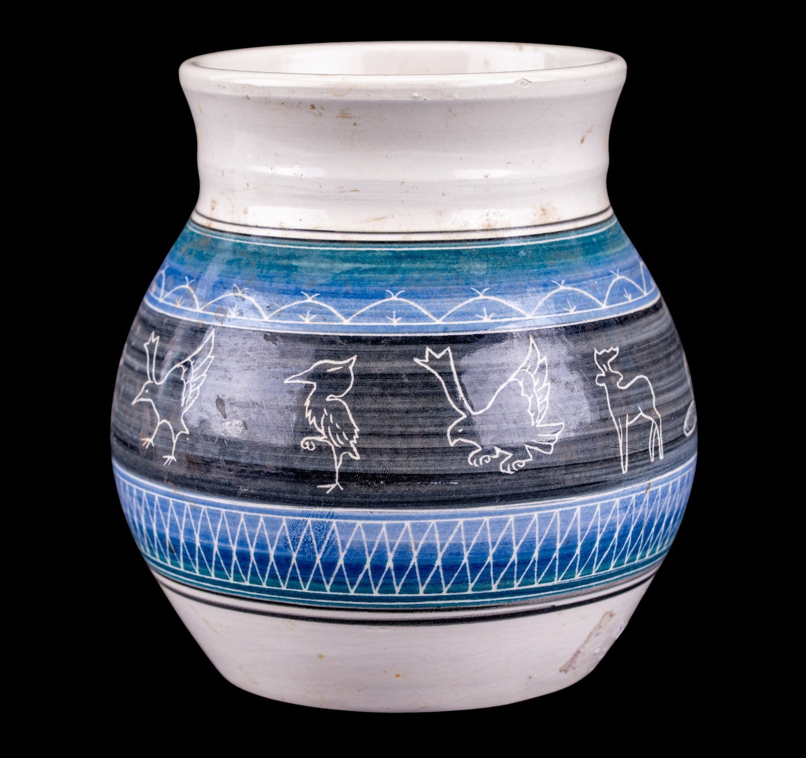 Signed Peter B Jones Panoramic Animal Story Pot: Wheel-thrown stoneware pot featuring a wraparound/panoramic narrative band of animal clan totems. Signed "P B Jones" and dated "01" (for 2001), etched into underside of pottery base. Peter B. Jones (b