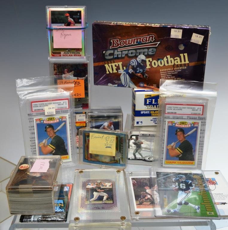 Grouping of Baseball Cards including McGuire Rooki: Grouping of baseball cards including; Mark McGuire 1988 rookie cards (2), Dunruss Frank Thomas elite series card, 1999 Upper Deck (set of 30), collection of Nolan Ryan cards, 1999 Topps Finest Basebal