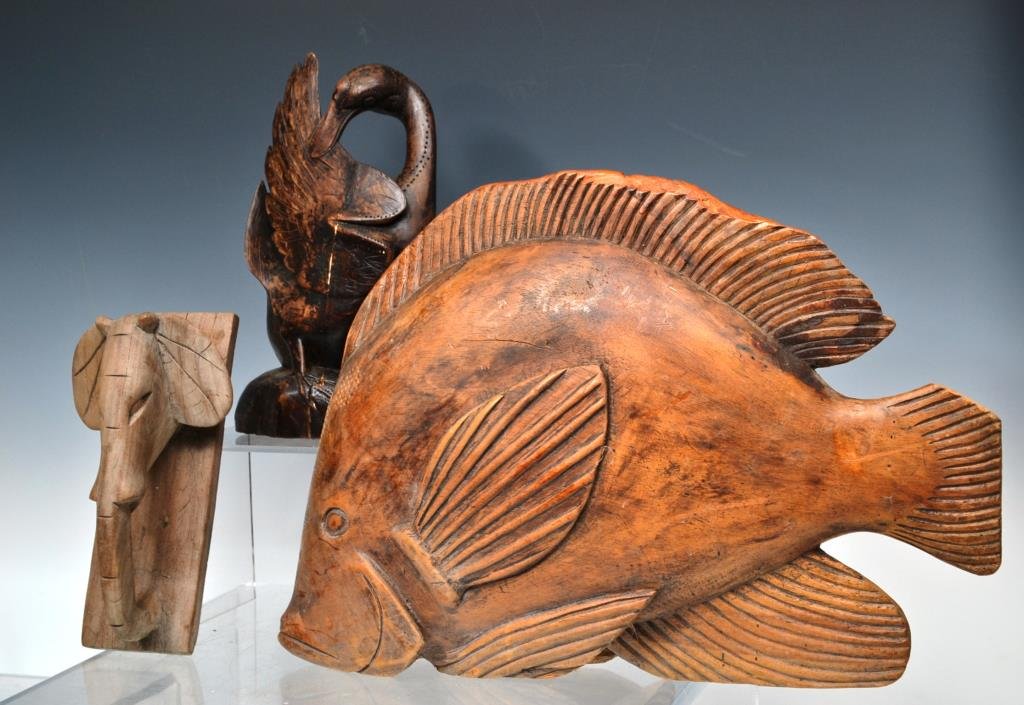 Grouping of Wood Carvings: Grouping of wood carvings including a large fish (measuring 12"h) and a smaller duck