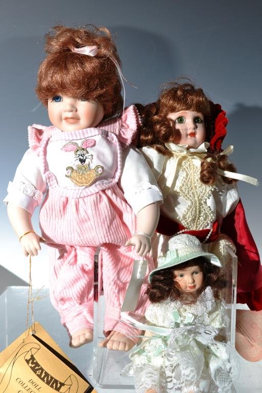 Grouping of Three Dolls: Maryse Nicole doll, a Seymour Mann "Emmie" doll, and a third smaller jointed porcelain doll that is unmarked