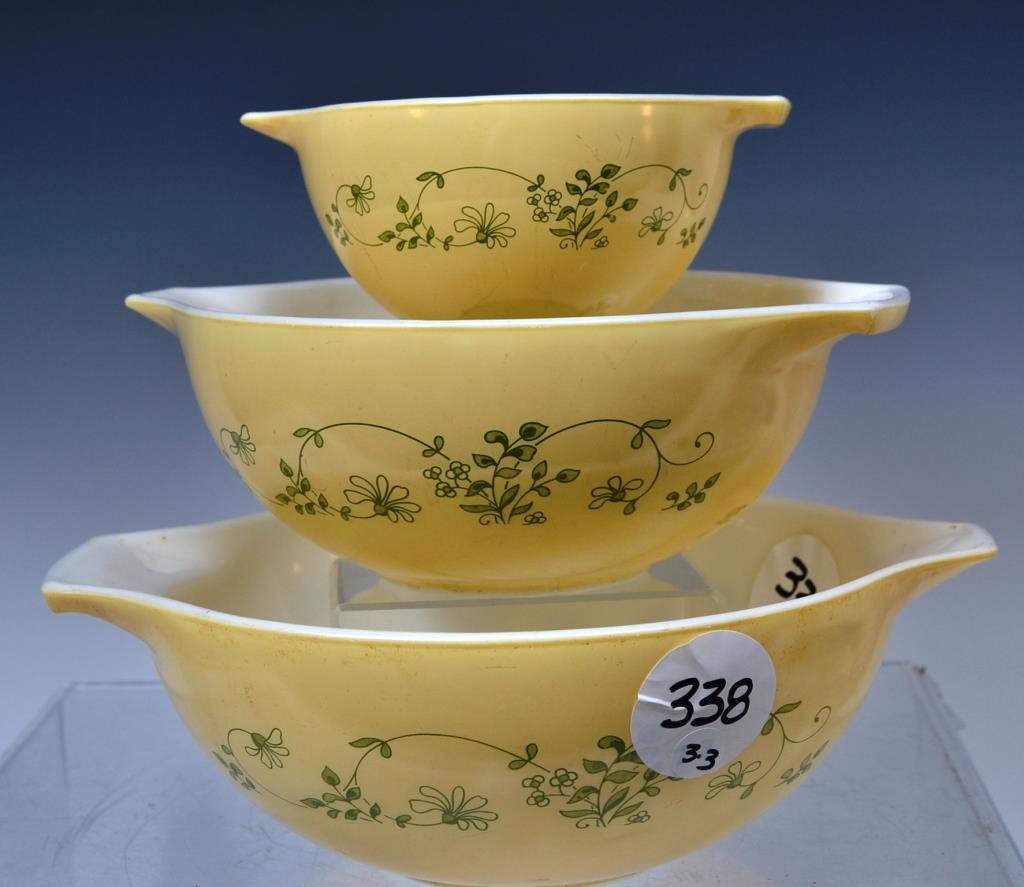 Vintage Pyrex Mixing Bowl Set in Yellow: Three graduated vintage Pyrex bowls, in yellow, with a green strawberry design