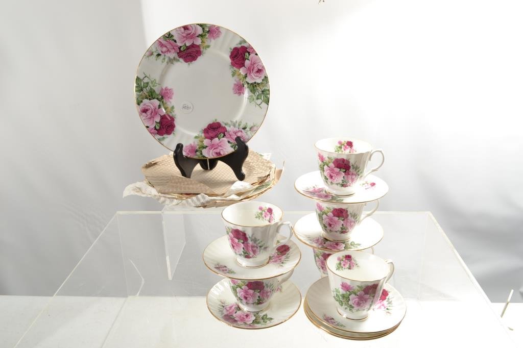 English China Grouping: Six cups and saucers, and matching plates measuring 8.5", marked "Duchess" Fine Bone China, made in England" NIB