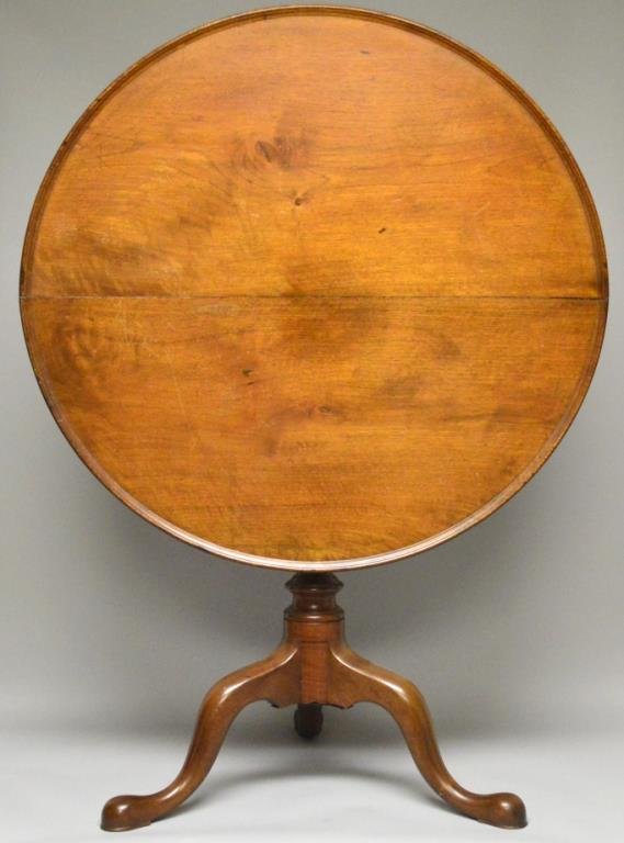 Pennsylvania Queen Anne Walnut Tea Table,: Pennsylvania Queen Anne walnut tea table, ca. 1790 with tilting dish top, birdcage and baluster turned standard over cabriole legs terminating in pad feet, 34" x 29"