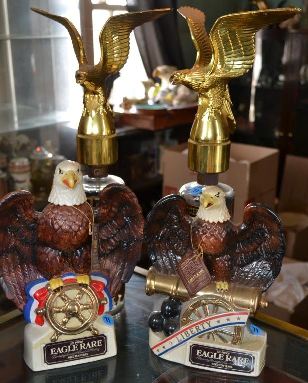 Four Eagle Whiskey Bottles: Four Eagle whiskey bottles including two Eagle rare Kentucky straight Bourbon whiskey bottles and a generic Bourbon bottle and a generic scotch bottle with eagle pouring mechanisms