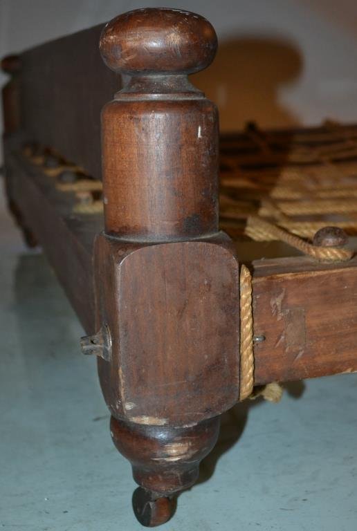 19thC Trundle Bed: 19thC Trundle bed, rope and peg suspension, appx Twin size mattress, 12"h x 42"w x 73"d
