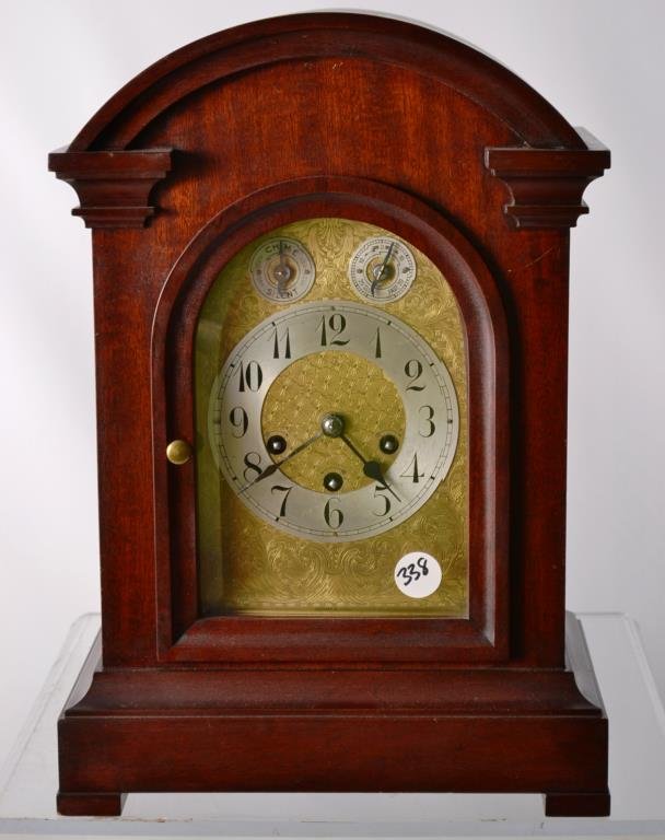 German Junghans Mantle Clock: German Junghans mantle clock, face marked K.C. Company Mantle Clock measures 17"h x 12"w x 7.5"d