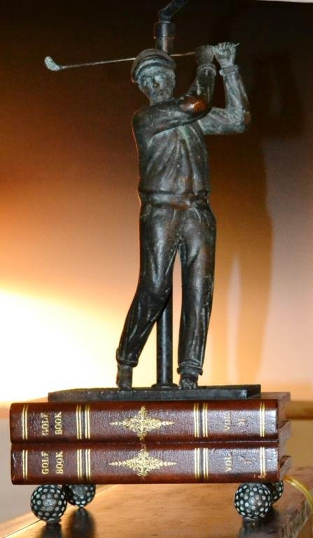 Bronze Figural Lamp by Maitland Smith: Bronze figural lamp featuring a man golfing, base of marble and wood, with finial and bronze feet in the form of golf balls, lamp measures appx 32"h