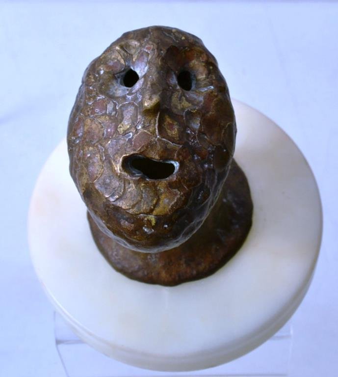 Klaus Ihlenfeld Portrait Doorknob: Klaus Ihlenfeld doorknob in the form of a human face, measures appx 5"h on marbel base measuring 5" dia