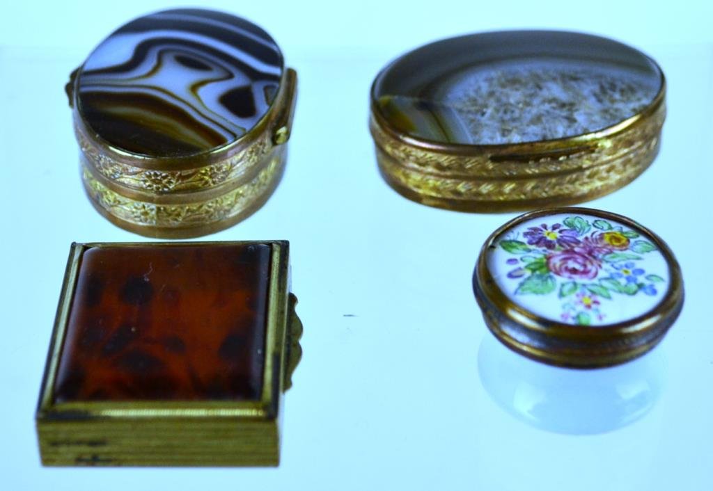 Pillbox Grouping: Grouping of three pillboxes, and a enamel patchbox, largest measures 1.75"