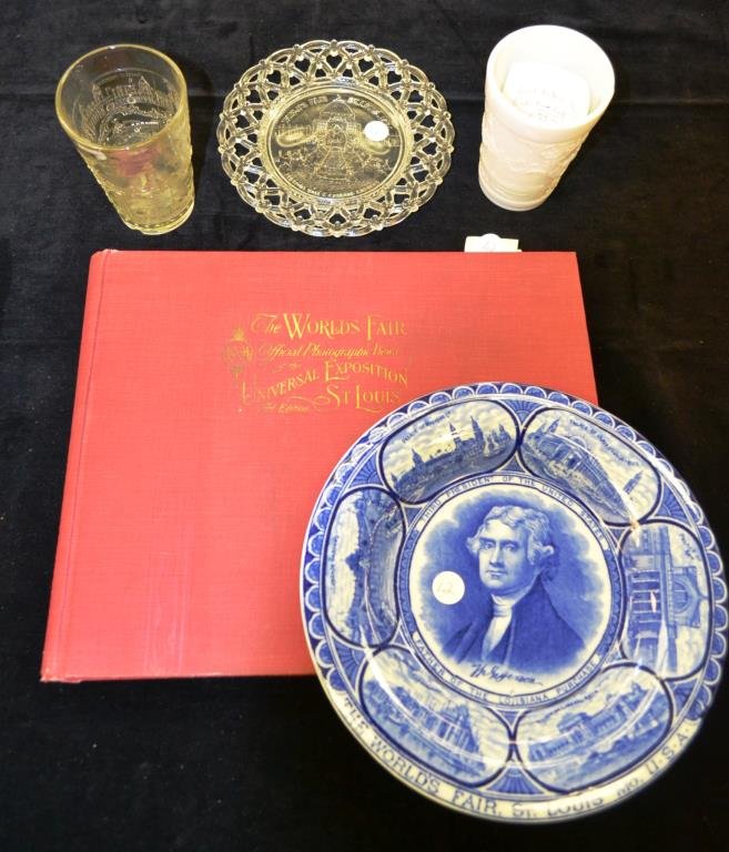 Grouping of 1904 St Louis Worlds Fair Souvenirs: Grouping includes clear glass Cascade Gardens plate, clear glass souvenir cup, a milk glass cup, blue transferware plate showing Thomas Jefferson and made by Bowhind and Marsellus (England) and an off