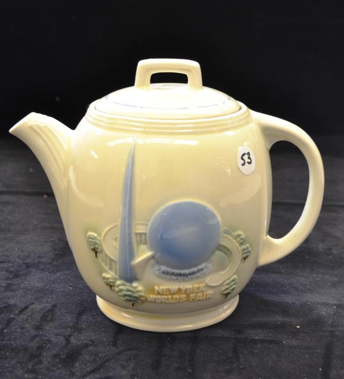 1939 New York World's Fair Teapot: 1939 New York World's Fair teapot, Porcelier trademark, made in the USA, with the Trylon and Perisphere design, has a hairline on the lid but in otherwise in good condition with excellent color