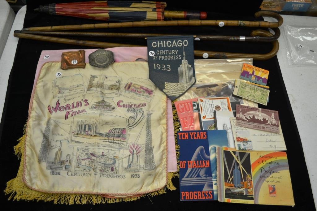 Memorabilia from the 1933 Worlds Fair Chicago: 1933 Worlds Fair Chicago grouping includes two ashtrays, one as-is parasol in red white and blue, three souvenir linens of the "Century of Progress" one felt pillow sleeve, a felt banner of a signific