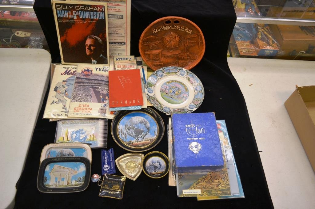 1963 New York Worlds Fair Grouping: Ephemera includes advertising, magazines, Texaco maps, a guide, "The Triumph of Man" (3 copies) "Billy Graham, Man in the Fifth Dimension" two Mets Yearbooks, "A Day at the NY Worlds Fair", trays, thr