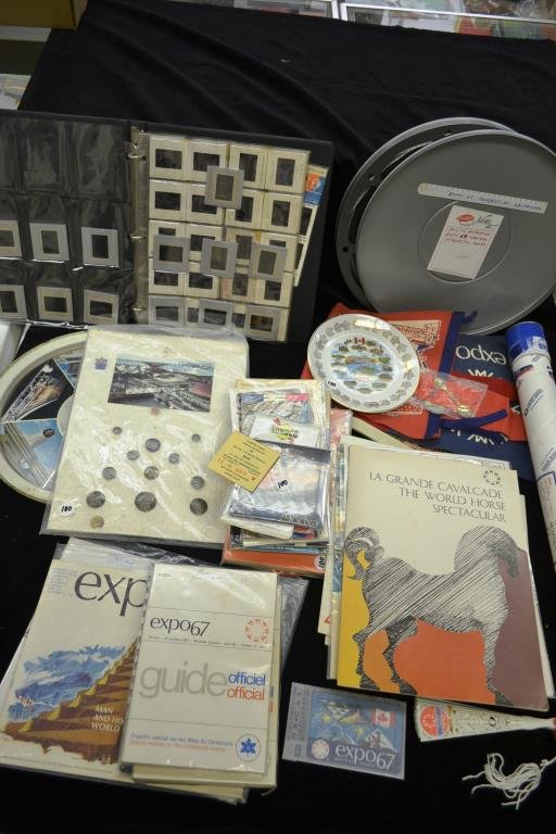 1967 Montreal Expo Souvenirs, Film with Sound, and: Pins, two decorative trays, two pennants, spoon, a fan, decorate plate, a very large film reel that reads "Expo '67, project at 24 frames, with Magnetic Sound" as well as ephemera