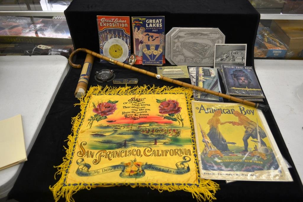 1937 & 1939 Worlds Fair Lots: includes a Great Lakes Expo cane, trivet, and Great Lakes Expo souvenir from Cleveland, also a San Francisco 1939 Time Magazine, a comb, official guidebooks (3) to the Golden Gate, a trivet, a Treasur
