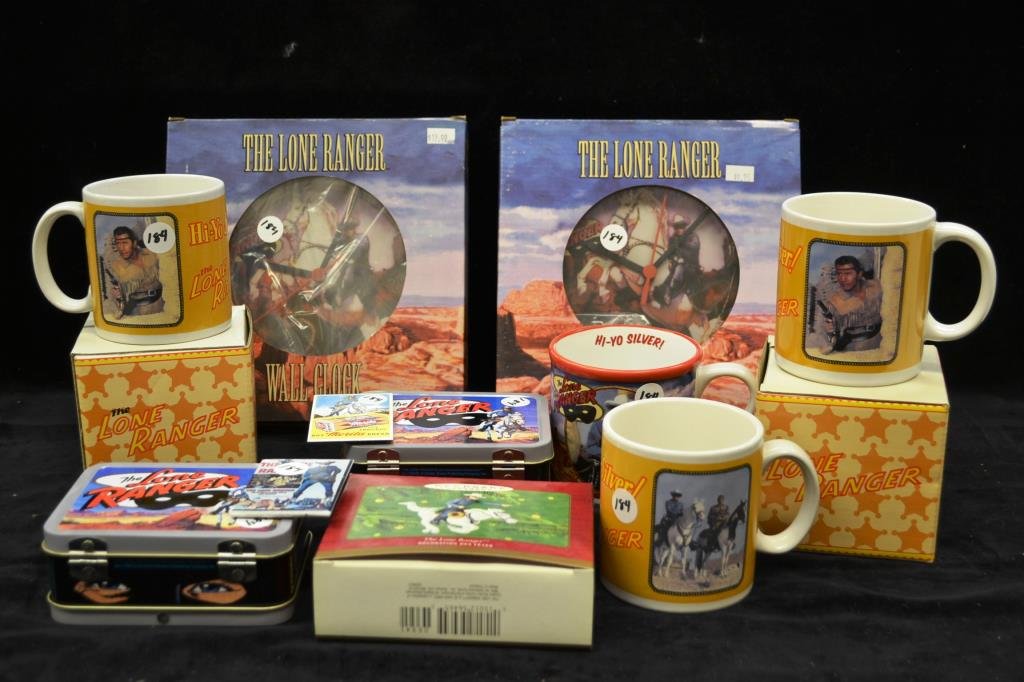 Modern Grouping of Lone Ranger Items: includes two wall clocks, four coffee mugs (two in original boxes) two Cheerios Premium mini lunch boxes (from 2001) a Hallmark Christmas ornament from 2000, and two Lone Ranger advertising magnets