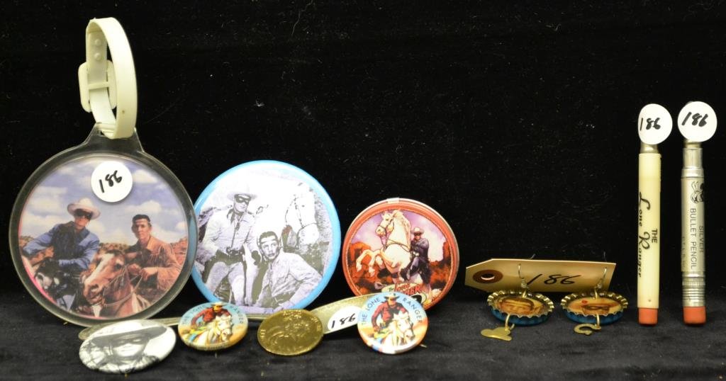 Grouping of Lone Ranger Collectables: Grouping of Lone Ranger collectables including; four pins, a Lone Ranger Lucky Coin, two Lone Ranger bullet pencils, Lone Ranger and Tonto bottle cap earrings, a silver plate Lone Ranger spoon, and tw