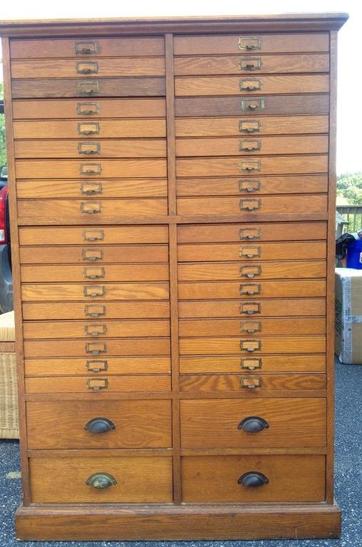 Early 20th Century Oak Watch Makers Cabinet: Early 20th Century Oak Watch Makers Cabinet or specimen cabinet with 40 drawers made by H. Herrmann Furniture Company, in good condition