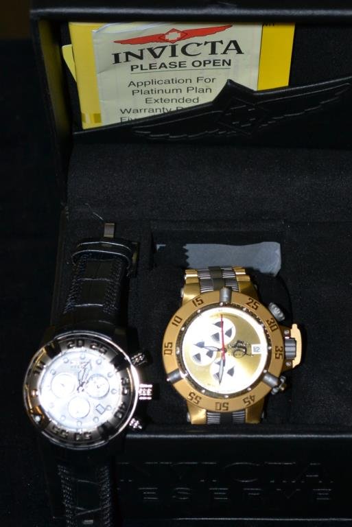 2 Invicta wrist watches.: Reserve, mod 14294 & mod 11644 along with a Invicta box fitted for one.