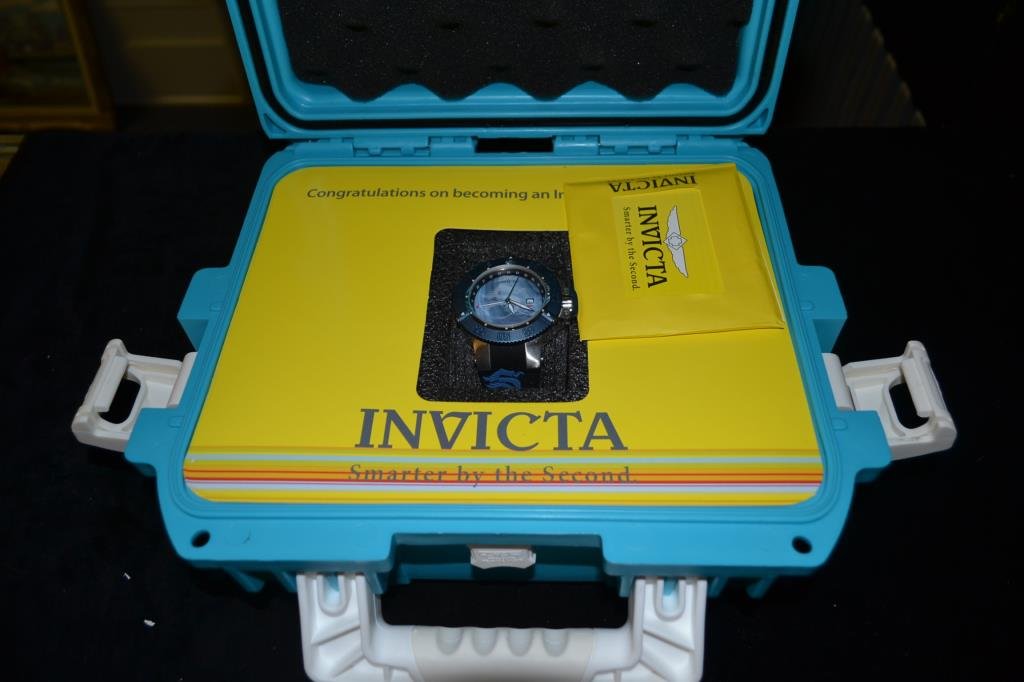 Invicta Watch and Hard Case: Invicta "Subaqua Noma 3" blue with dragon motif, in a blue Invicta hard case