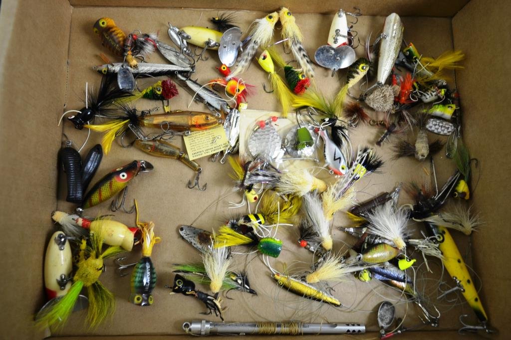 Large Grouping of Vintage Fishing Lures and Flies: Large grouping of vintage lures, weights, poppers, spinners, spoons, flies, named items include; a Heddon River Runt, Jitterbug, Hula Hopper (x3), Heddon Top Sonic, Devil's Horse, and many others