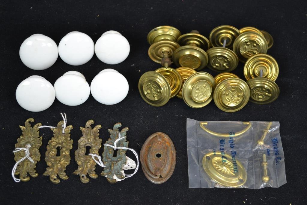 Grouping of Hardware: Hardware grouping includes six porcelain drawer pulls, eight brass drawer pulls with Scottish Thistle embossed design, and ten matching brass key hole escutcheons