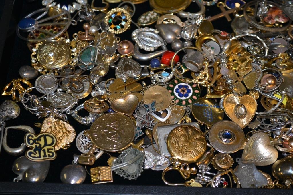 Lot of Costume Pendants: Large grouping of pins, pendants, lockets and charms. Includes some marked sterling and gold fill items.